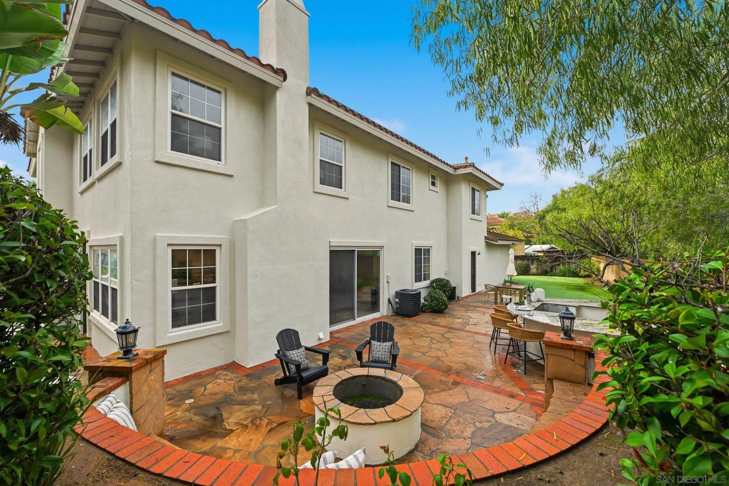 12632 Footman Lane Poway, CA 92064 - Photo 43 of 48 a view of a house with backyard and sitting area