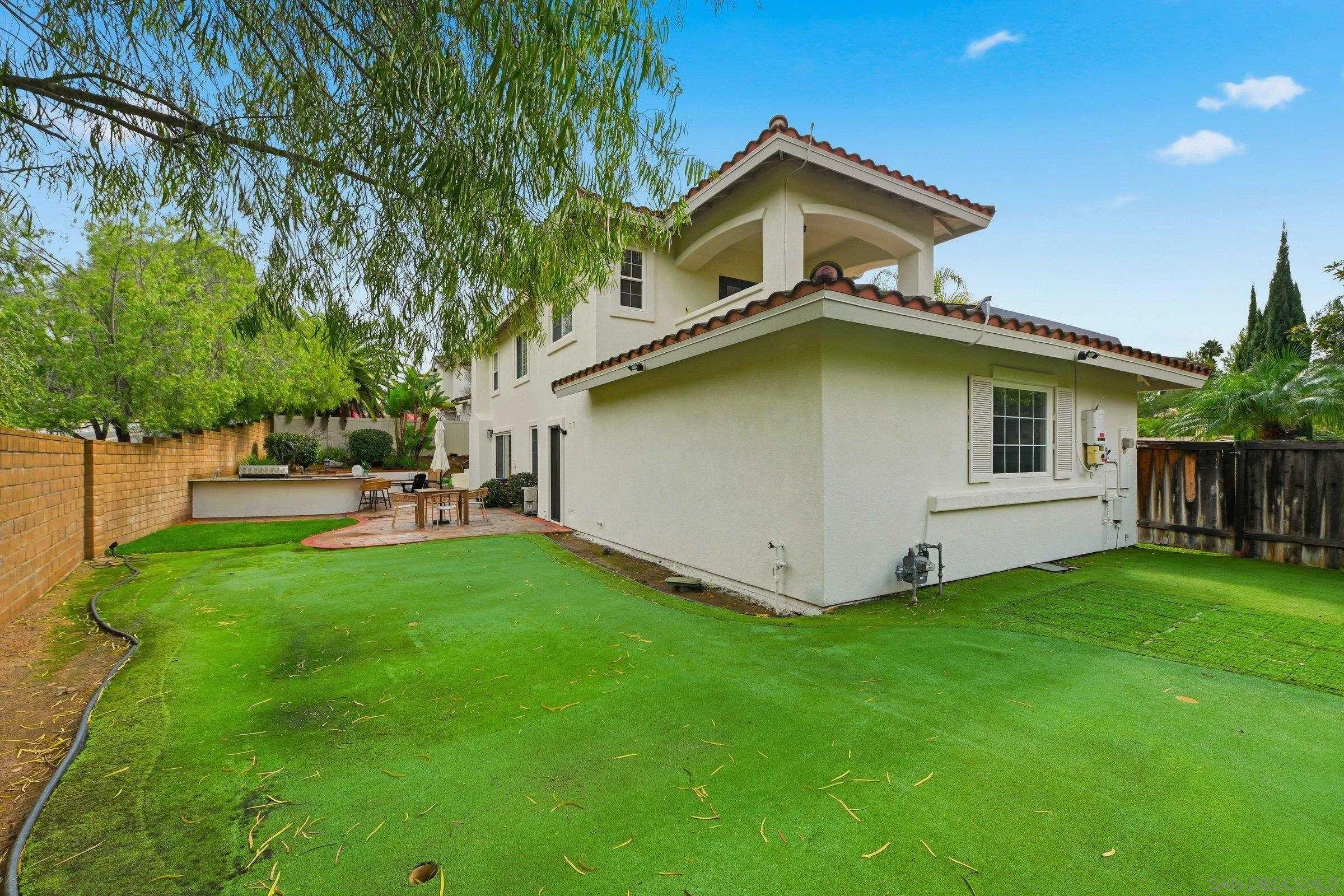 12632 Footman Lane Poway, CA 92064 - Photo 47 of 48 a backyard of a house with table and chairs