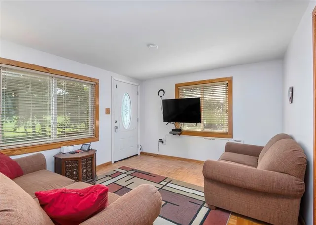 a living room with furniture and a couch