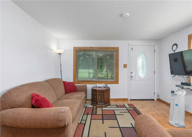 a very nice looking kitchen with a large window