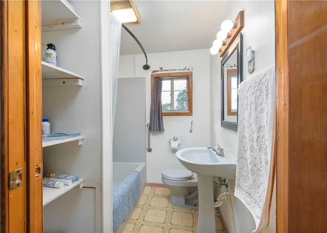 a bathroom with a sink and a bathtub