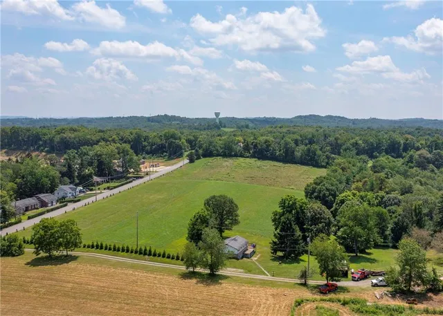 a view of a lake with a yard