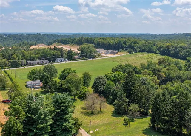 a view of a lake with a yard