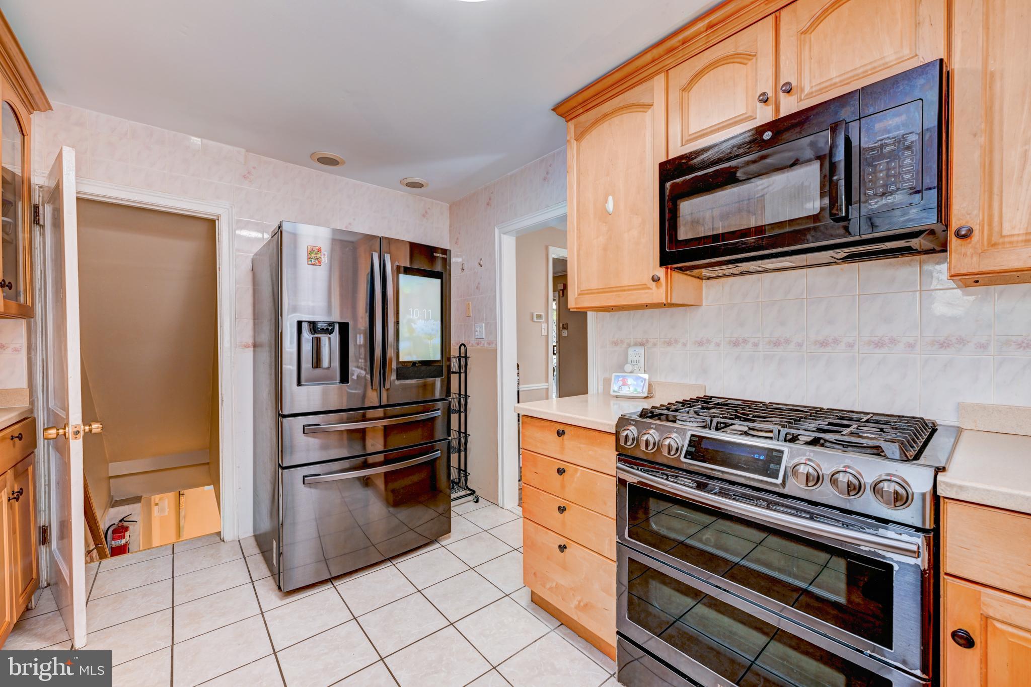 14 Summit Avenue Wyncote, PA 19095 - Photo 12 of 36 a kitchen with appliances and cabinets
