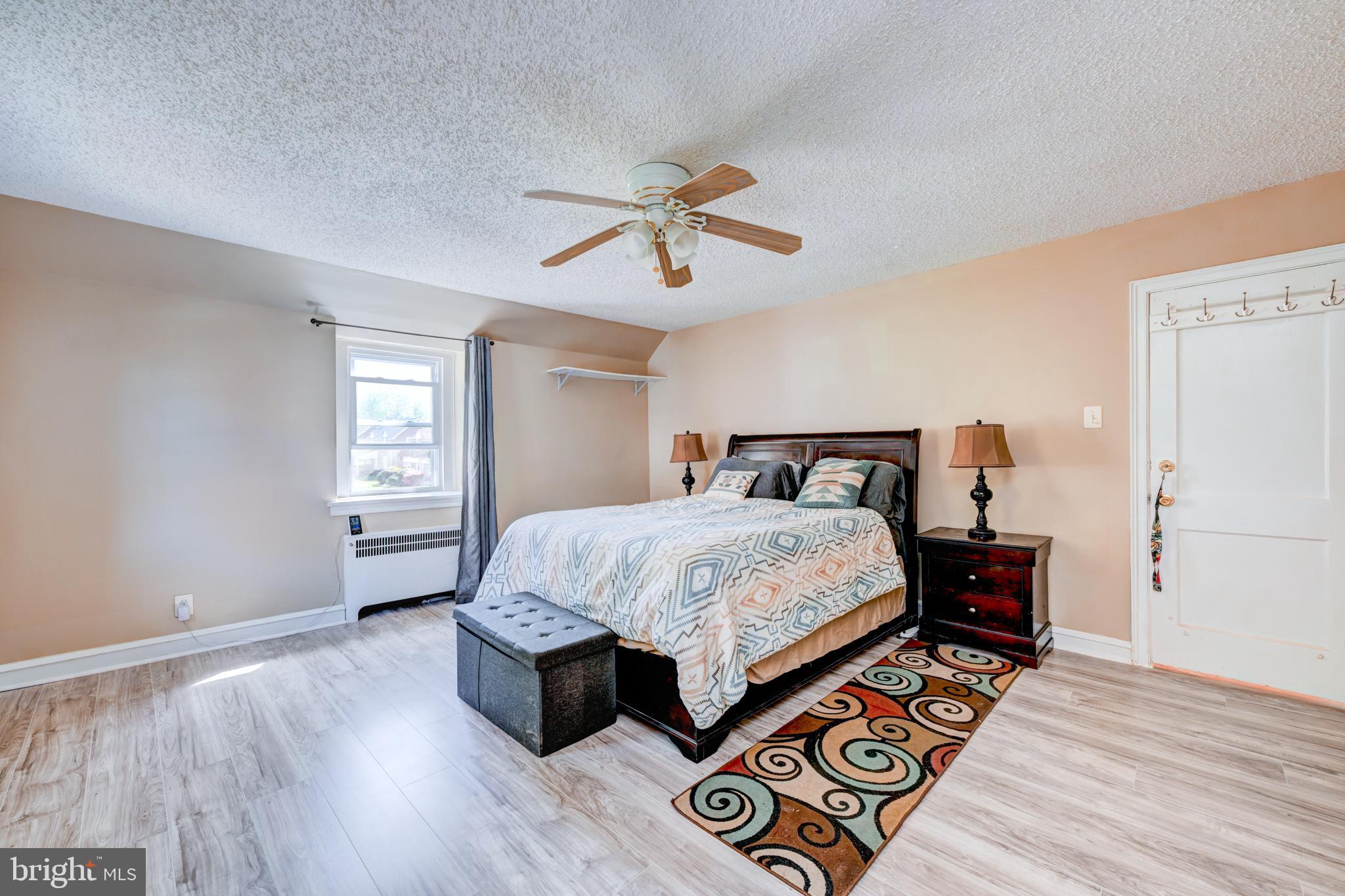 14 Summit Avenue Wyncote, PA 19095 - Photo 16 of 36 a bedroom with bed and wooden floor