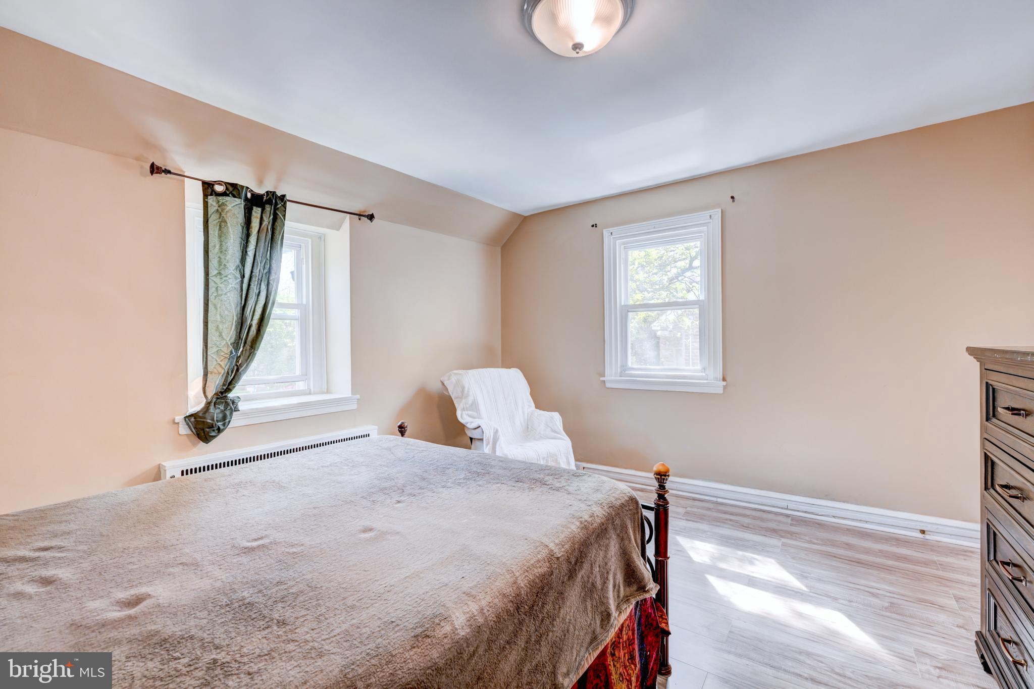 14 Summit Avenue Wyncote, PA 19095 - Photo 21 of 36 a bedroom with a bed and a window