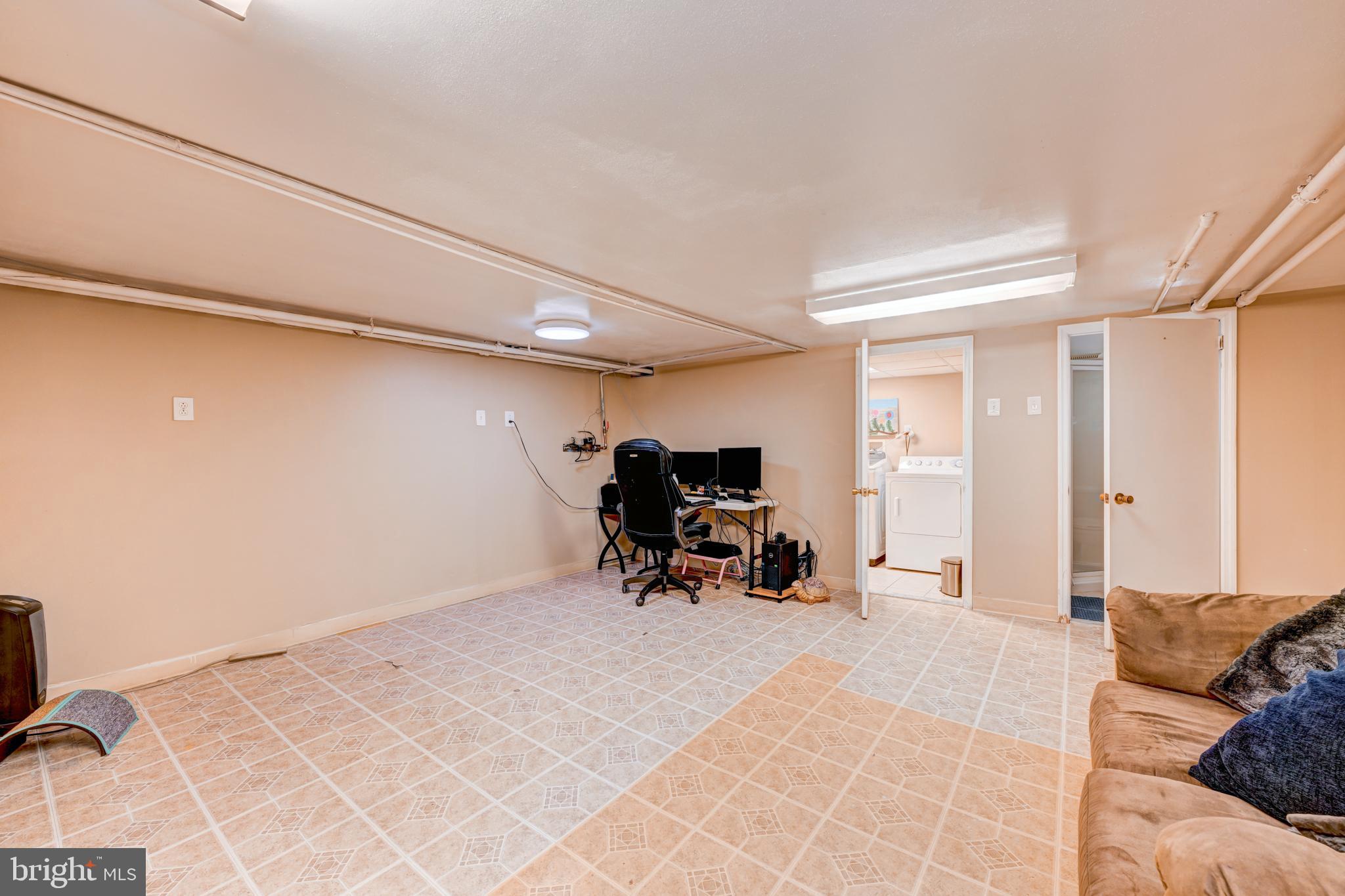 14 Summit Avenue Wyncote, PA 19095 - Photo 23 of 36 a bed room with a bed and a chair