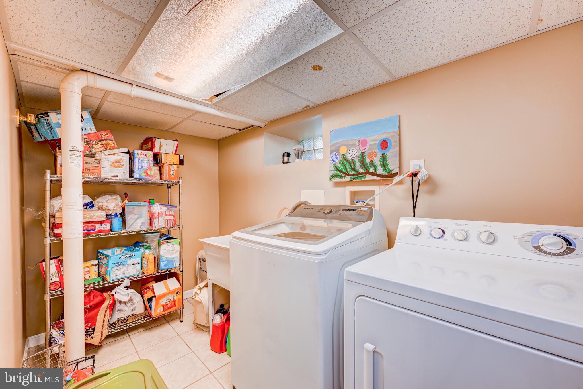 14 Summit Avenue Wyncote, PA 19095 - Photo 26 of 36 a utility room with dryer and washer