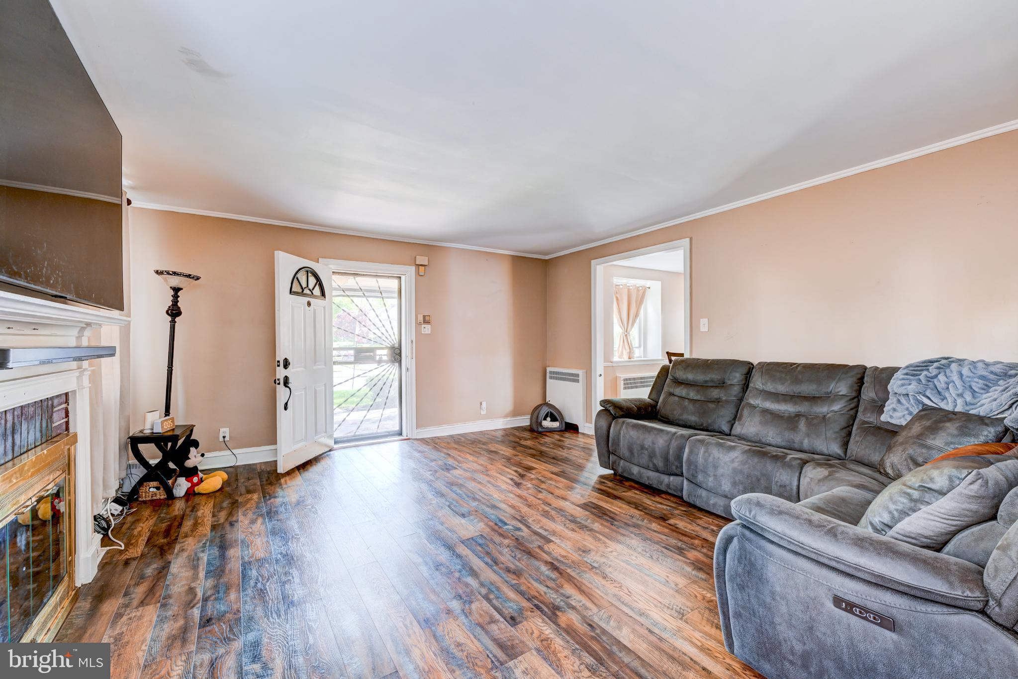 14 Summit Avenue Wyncote, PA 19095 - Photo 5 of 36 a living room with furniture and a fireplace