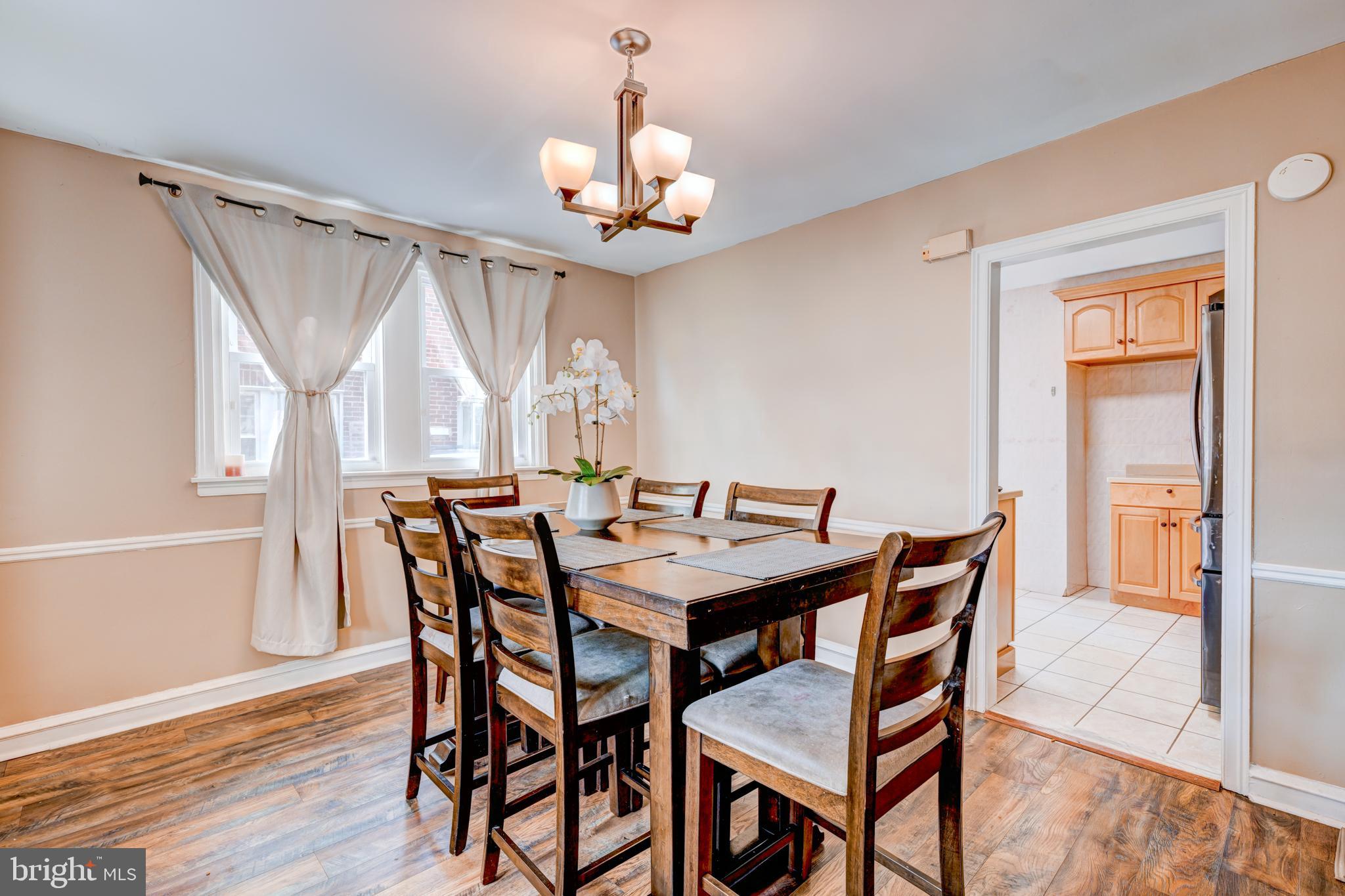 14 Summit Avenue Wyncote, PA 19095 - Photo 7 of 36 a view of a dining room with furniture window and wooden floor