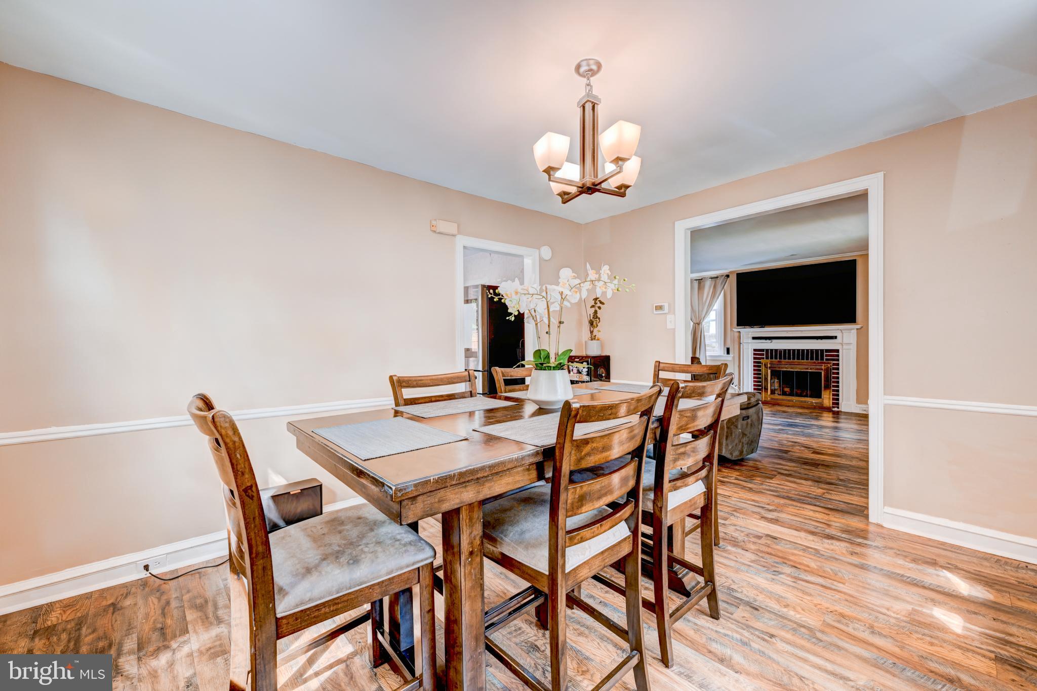14 Summit Avenue Wyncote, PA 19095 - Photo 9 of 36 a view of a dining room with furniture wooden floor and a chandelier