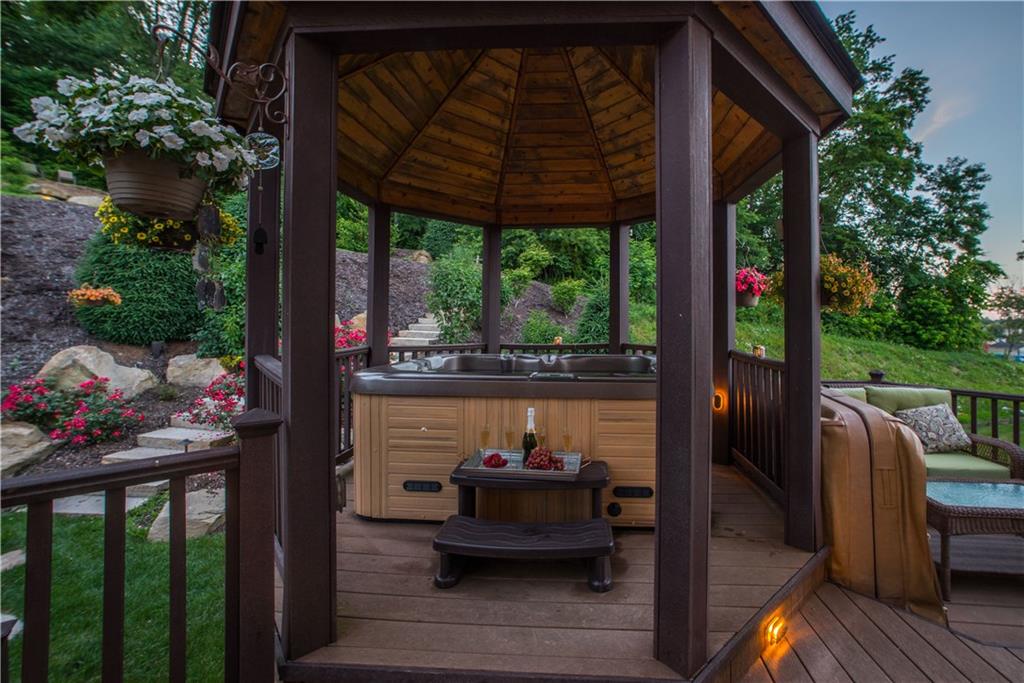 211 Field Club Circle McKees Rocks, PA 15136 - Photo 22 of 25 This charming gazebo holds a hot tub for romantic and relaxing evenings. The hot tub lights up, as do the surrounding wired-in ambient lights on the deck for an additional elegant atmosphere.
