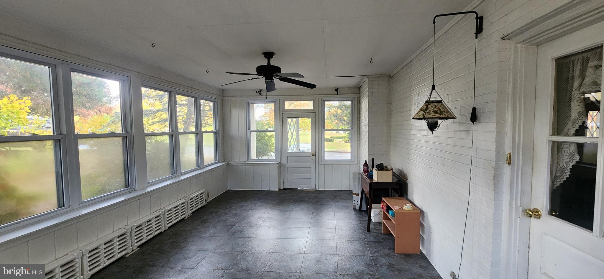 4846 Londonderry Road Harrisburg, PA 17109 - Photo 21 of 51 wooden floor in an empty room with a window