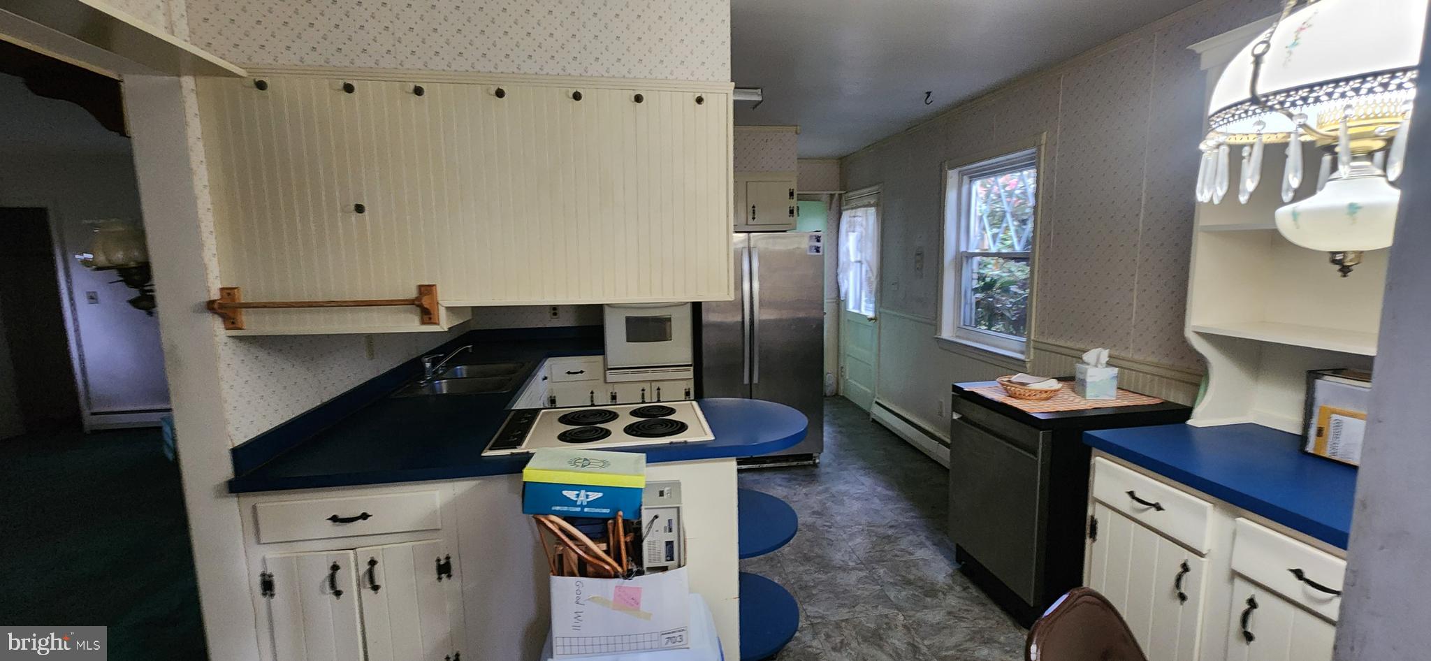 4846 Londonderry Road Harrisburg, PA 17109 - Photo 22 of 51 a kitchen with stainless steel appliances a stove a refrigerator and a counter space