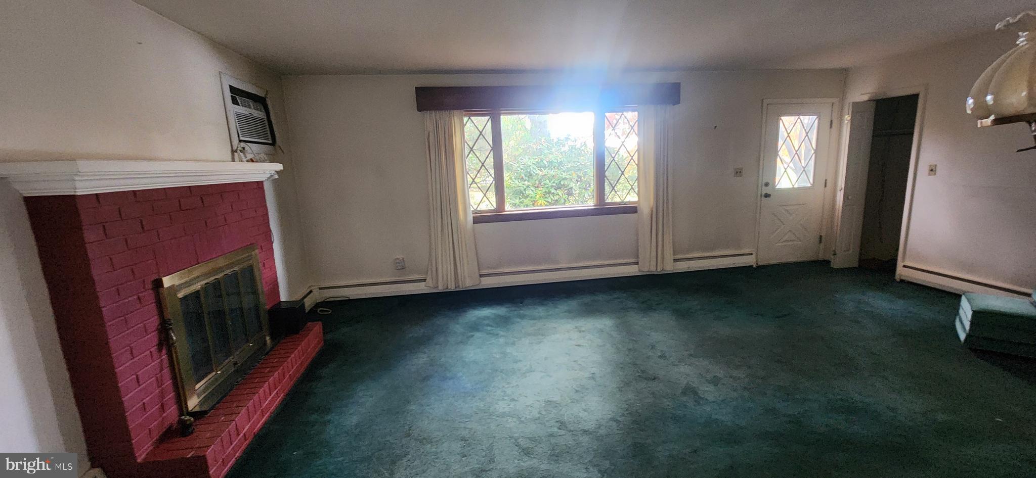 4846 Londonderry Road Harrisburg, PA 17109 - Photo 34 of 51 wooden floor in an empty room with a fireplace