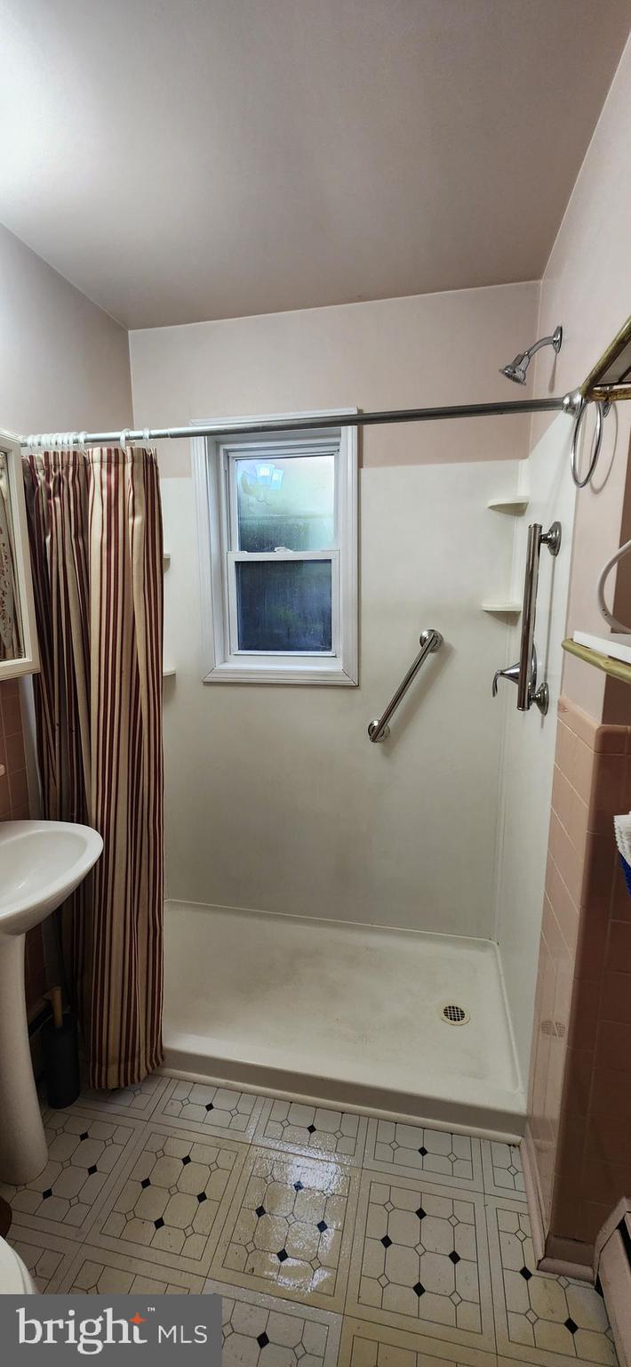 4846 Londonderry Road Harrisburg, PA 17109 - Photo 38 of 51 a bathroom with a shower