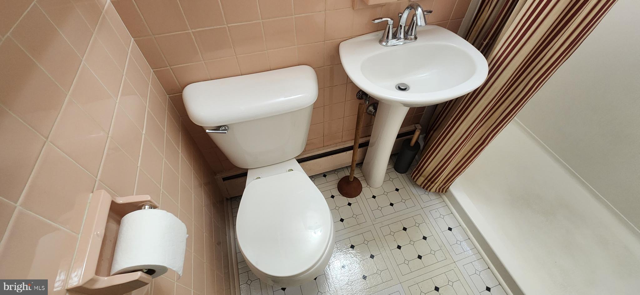 4846 Londonderry Road Harrisburg, PA 17109 - Photo 39 of 51 a bathroom with a sink mirror and toilet
