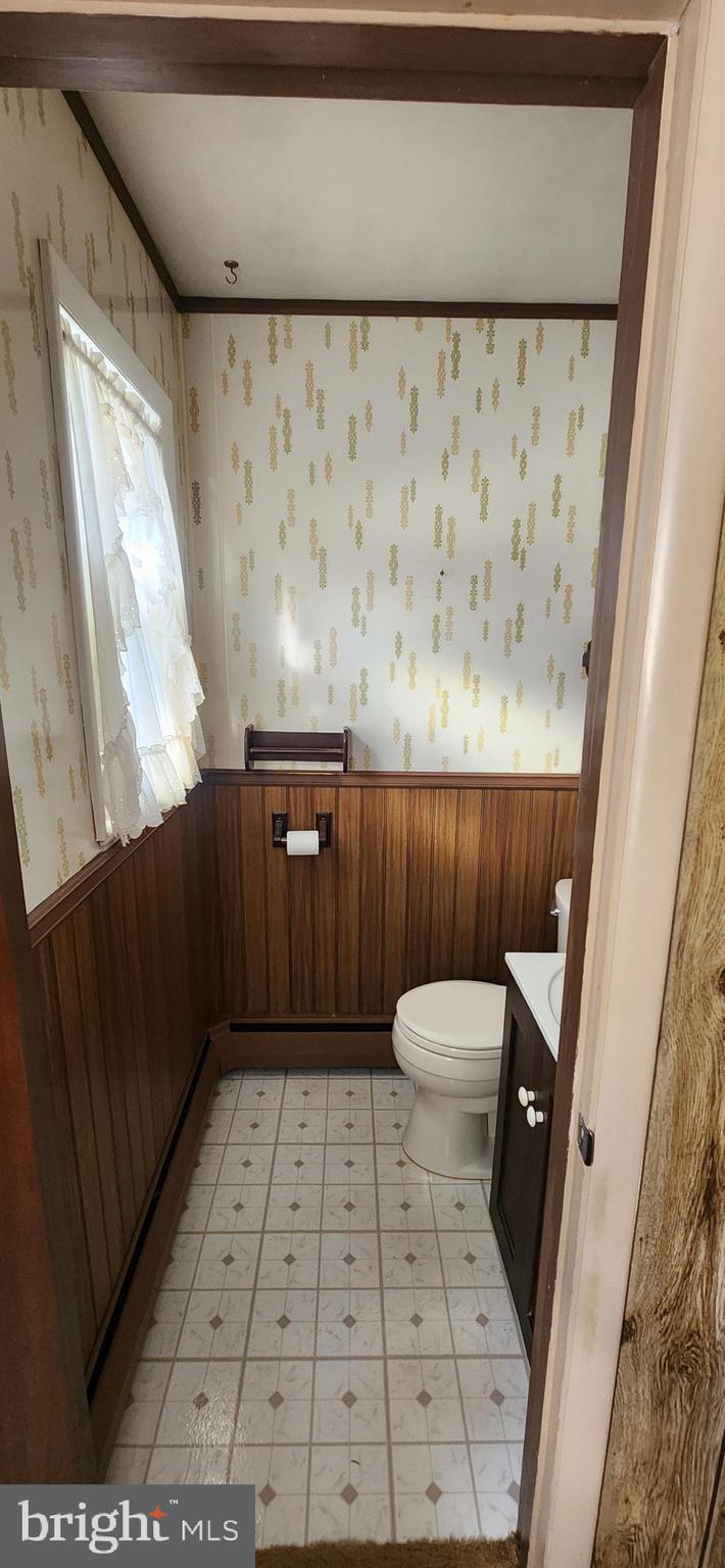 4846 Londonderry Road Harrisburg, PA 17109 - Photo 47 of 51 a bathroom with a sink a toilet and a shower