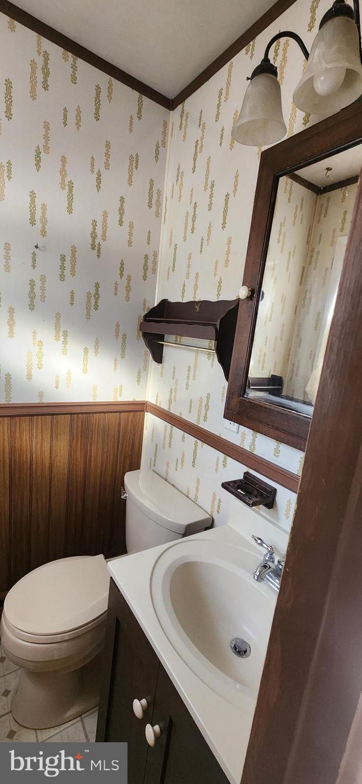 4846 Londonderry Road Harrisburg, PA 17109 - Photo 48 of 51 a bathroom with a toilet and a sink