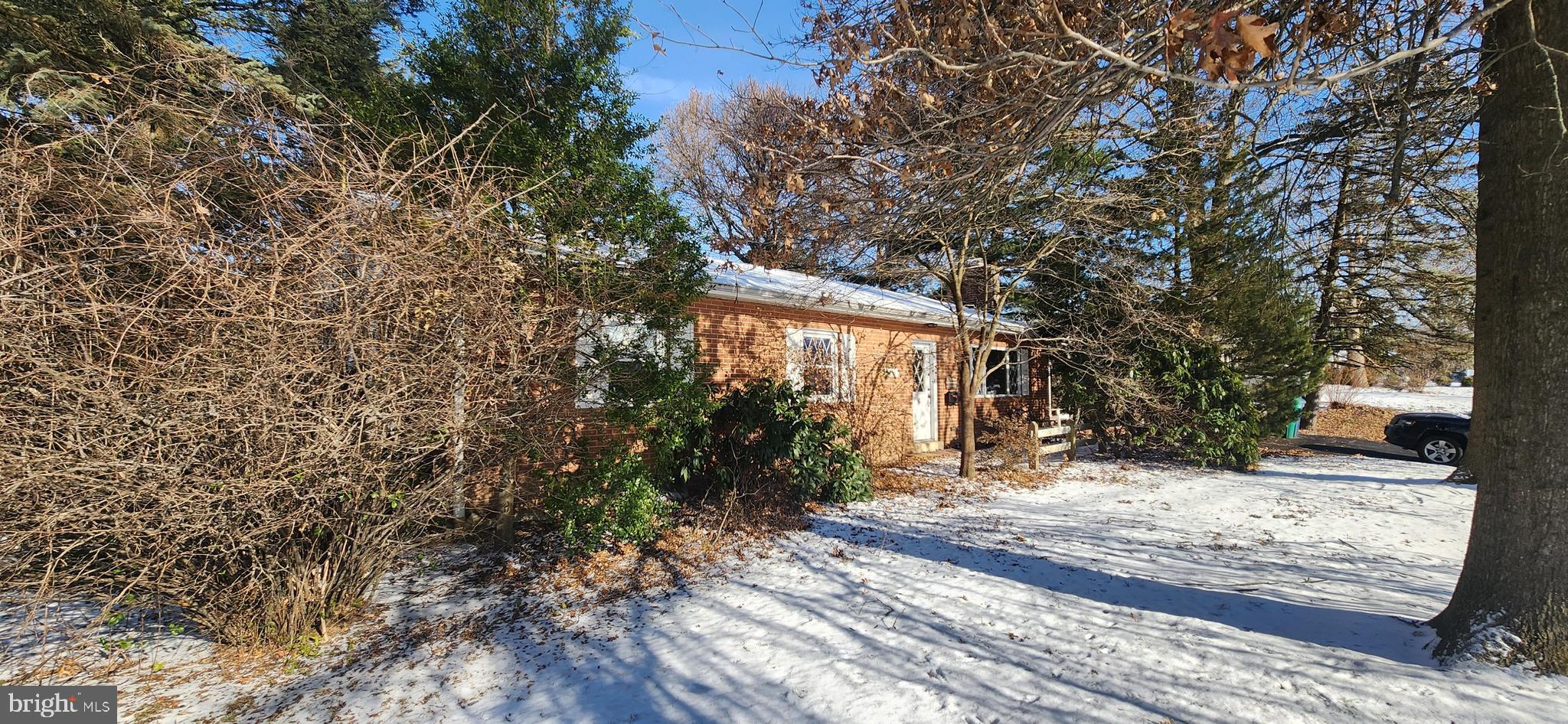 4846 Londonderry Road Harrisburg, PA 17109 - Photo 5 of 51 a view of a yard covered with snow