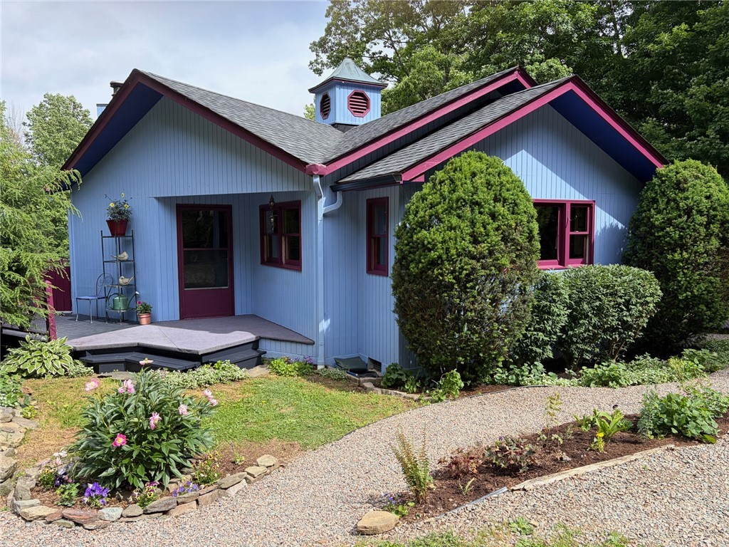873 Silverleaf Road Zionville, NC 28698 - Photo 2 of 49 a front view of a house with garden