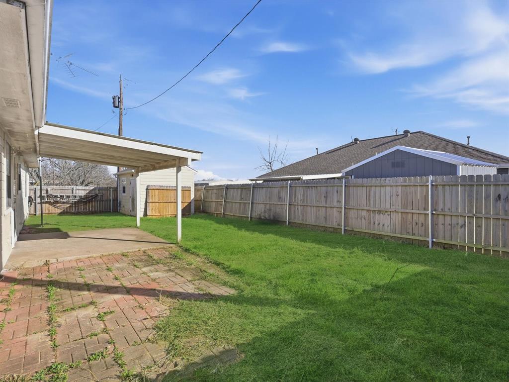 701 College Street Celeste, TX 75423 - Photo 22 of 29 a view of a backyard of the house