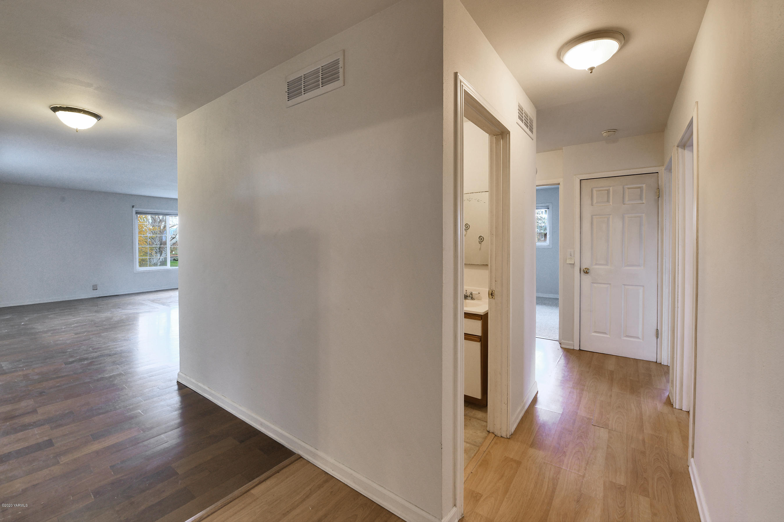 951 Batali Road Harrah, WA 98933 - Photo 22 of 22 wooden floor in an empty room with wooden floor