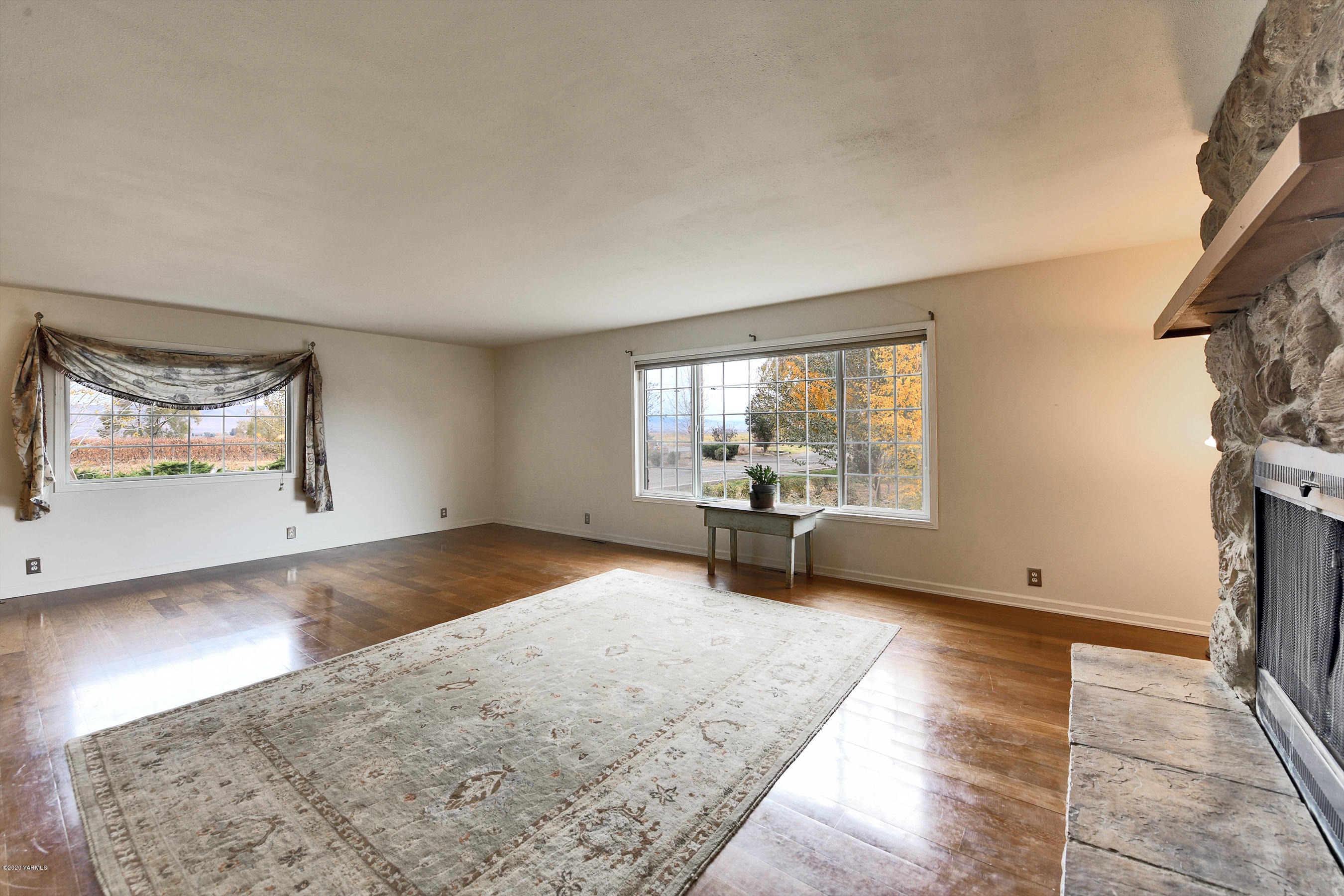951 Batali Road Harrah, WA 98933 - Photo 6 of 22 a view of a room with furniture and a fireplace