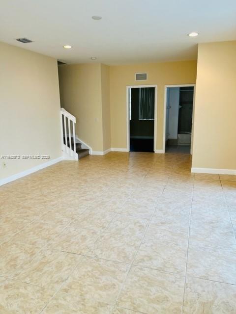 15655 Southwest 41st Street, Unit 201 Miramar, FL 33027 - Photo 5 of 18 an empty room with a bathroom
