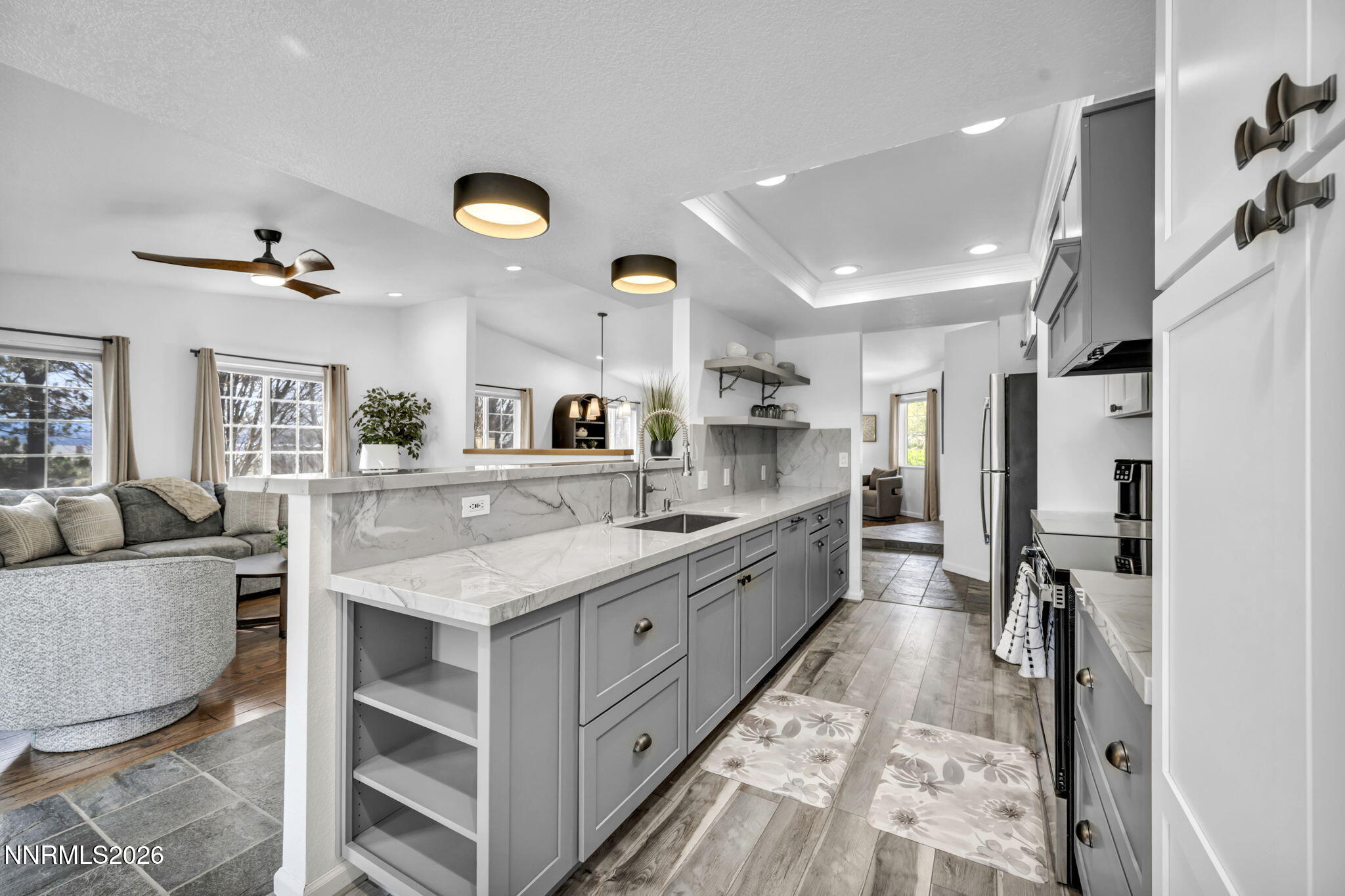 11680 Campo Rico Lane Sparks, NV 89441 - Photo 1 of 61 a large kitchen with stainless steel appliances kitchen island granite countertop a sink and cabinets