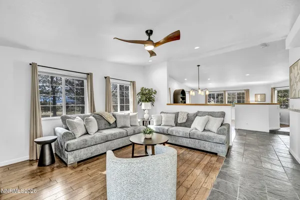 a living room with furniture and a window