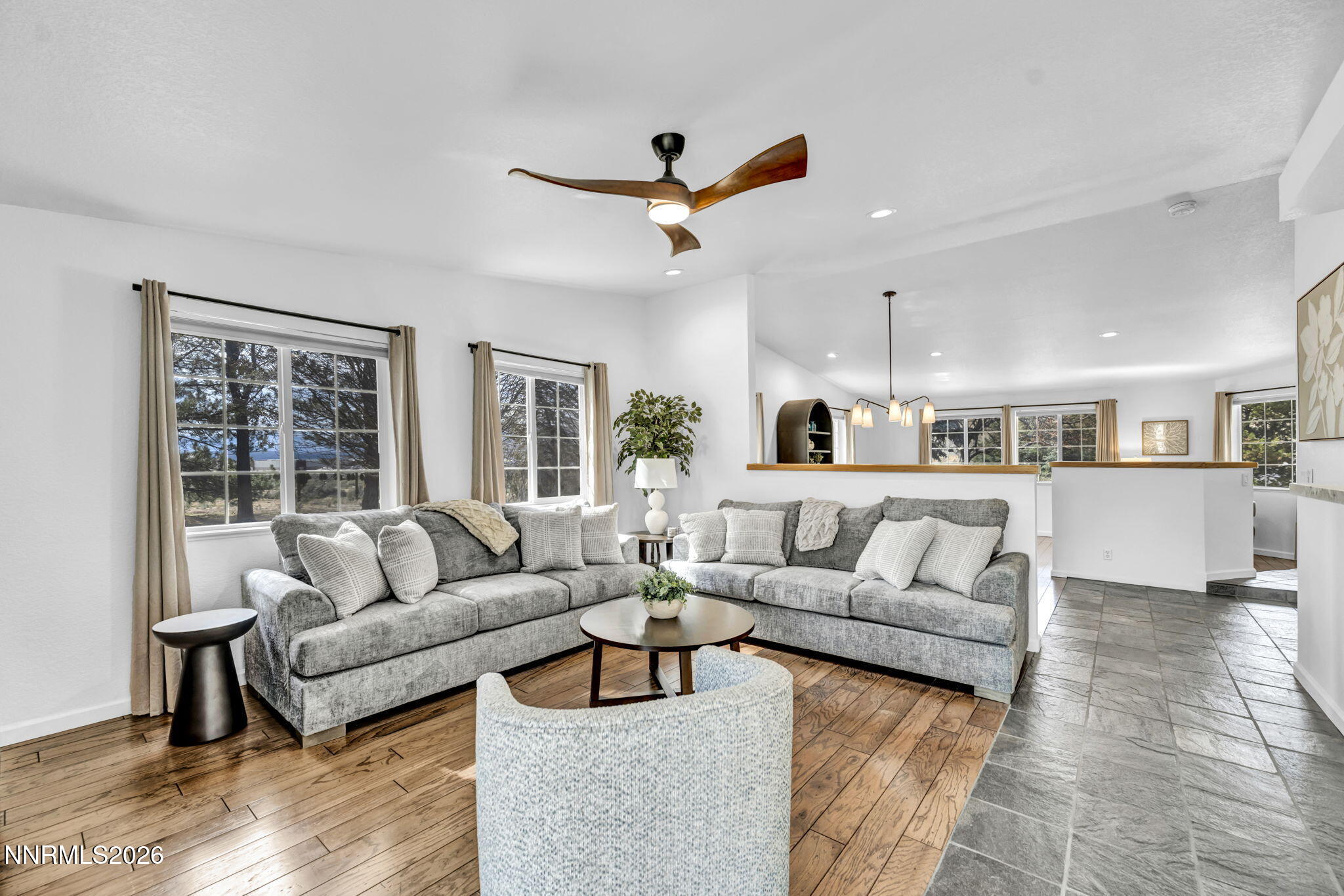 11680 Campo Rico Lane Sparks, NV 89441 - Photo 14 of 61 a living room with furniture and a large window