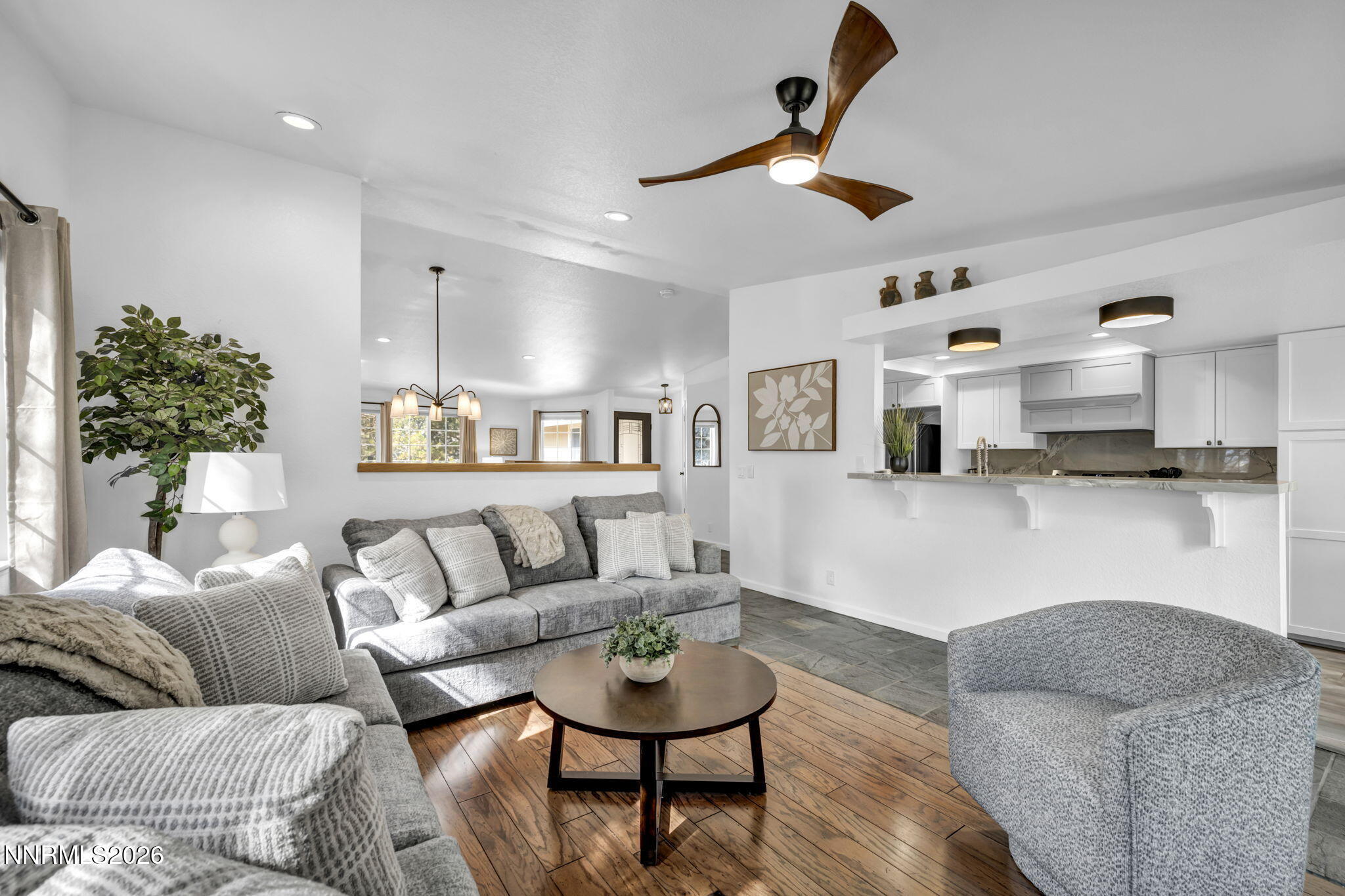 11680 Campo Rico Lane Sparks, NV 89441 - Photo 15 of 61 a living room with furniture and kitchen view