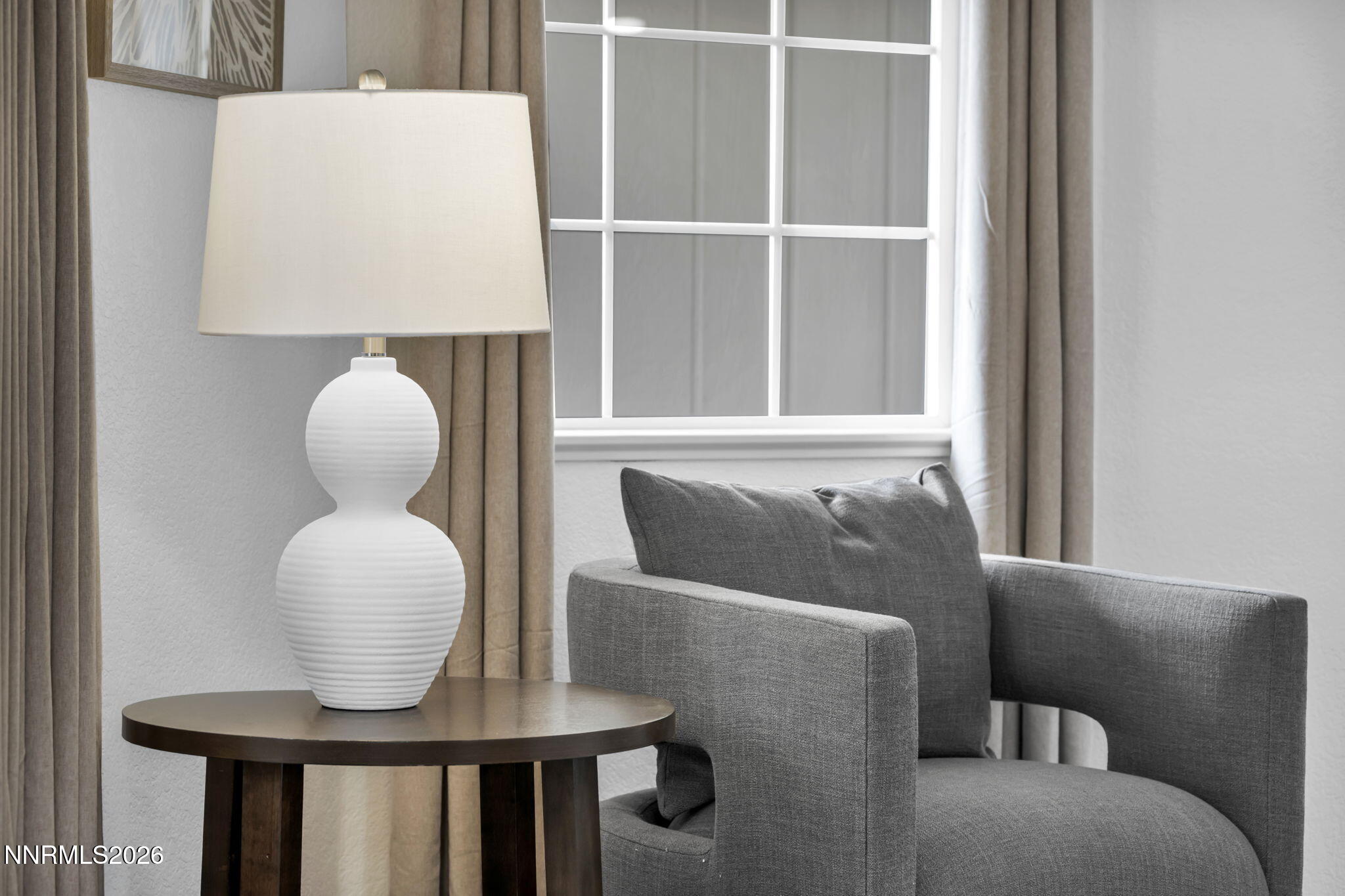 11680 Campo Rico Lane Sparks, NV 89441 - Photo 17 of 61 a living room with furniture and a window