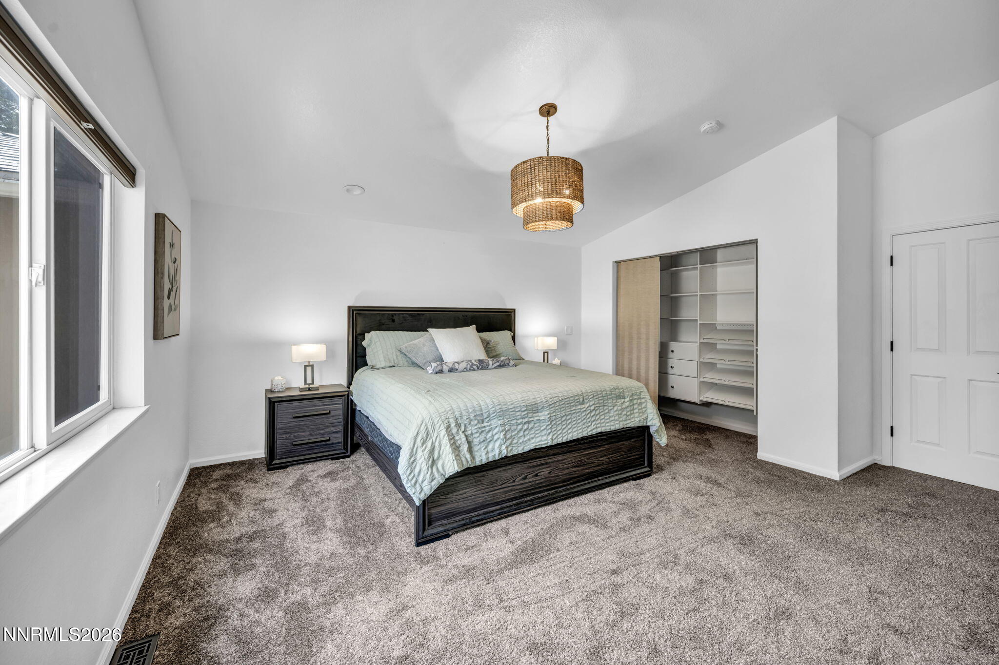11680 Campo Rico Lane Sparks, NV 89441 - Photo 31 of 61 a bedroom with a bed and a window