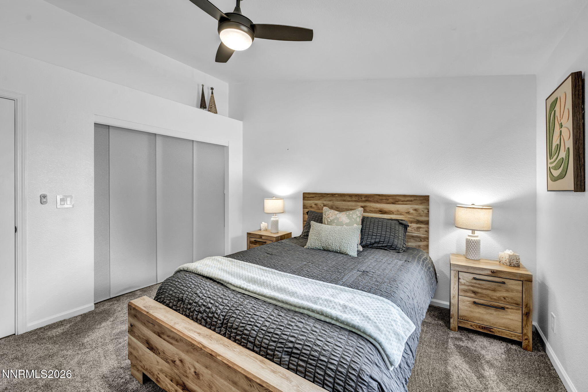 11680 Campo Rico Lane Sparks, NV 89441 - Photo 37 of 61 a bedroom with a bed and dresser