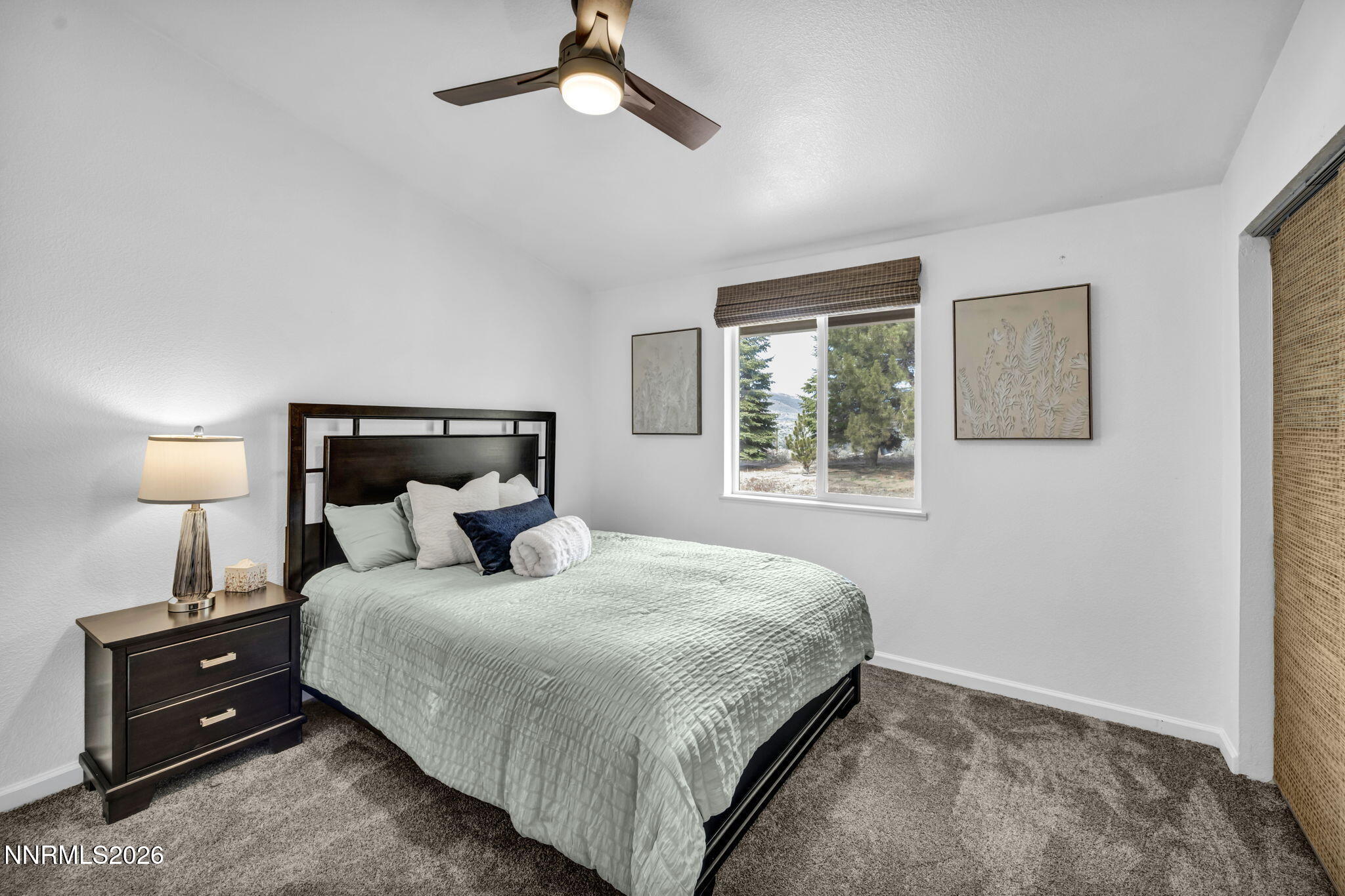 11680 Campo Rico Lane Sparks, NV 89441 - Photo 39 of 61 a bedroom with a bed and window