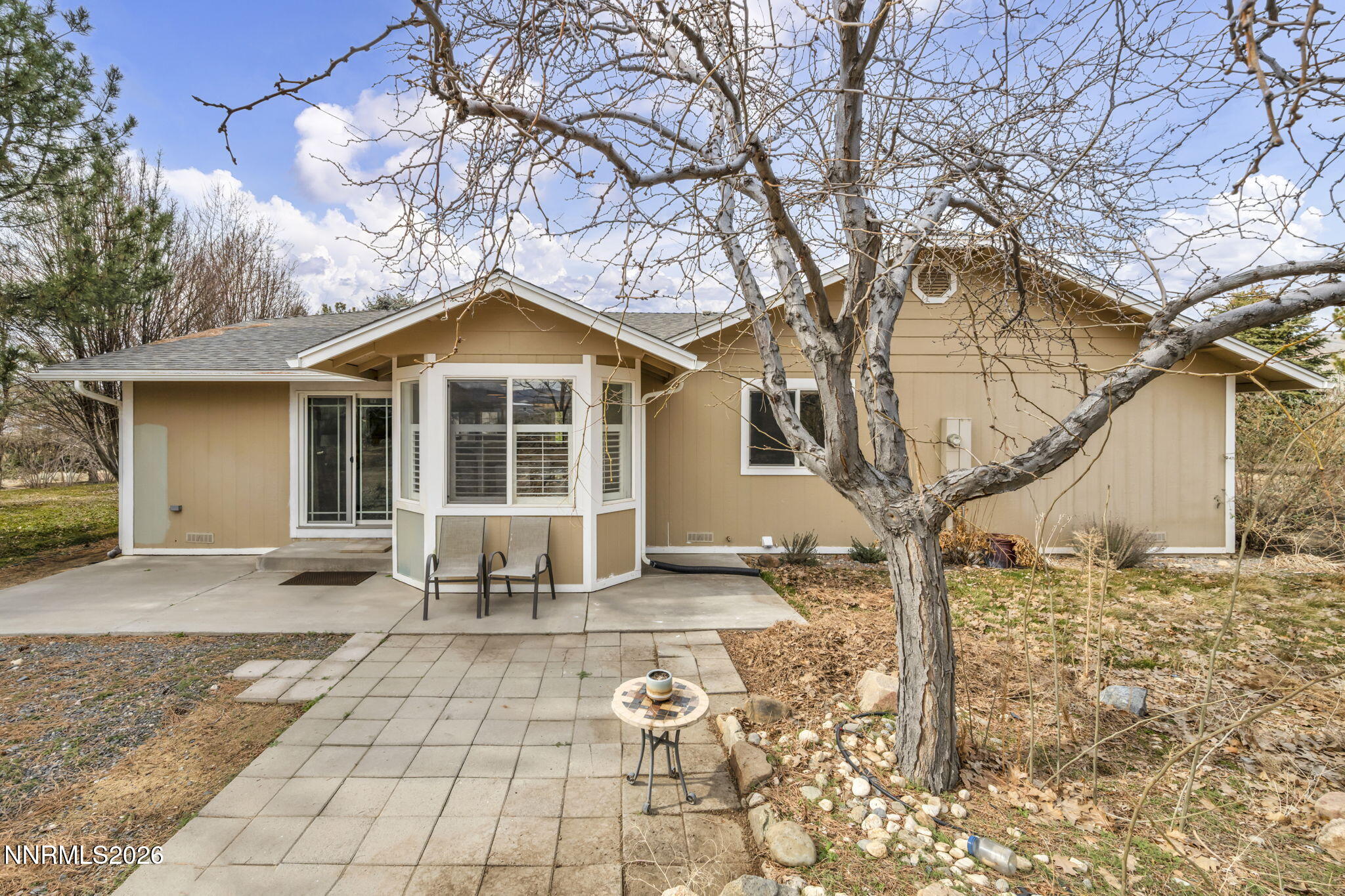 11680 Campo Rico Lane Sparks, NV 89441 - Photo 49 of 61 a front view of a house with yard and seating space