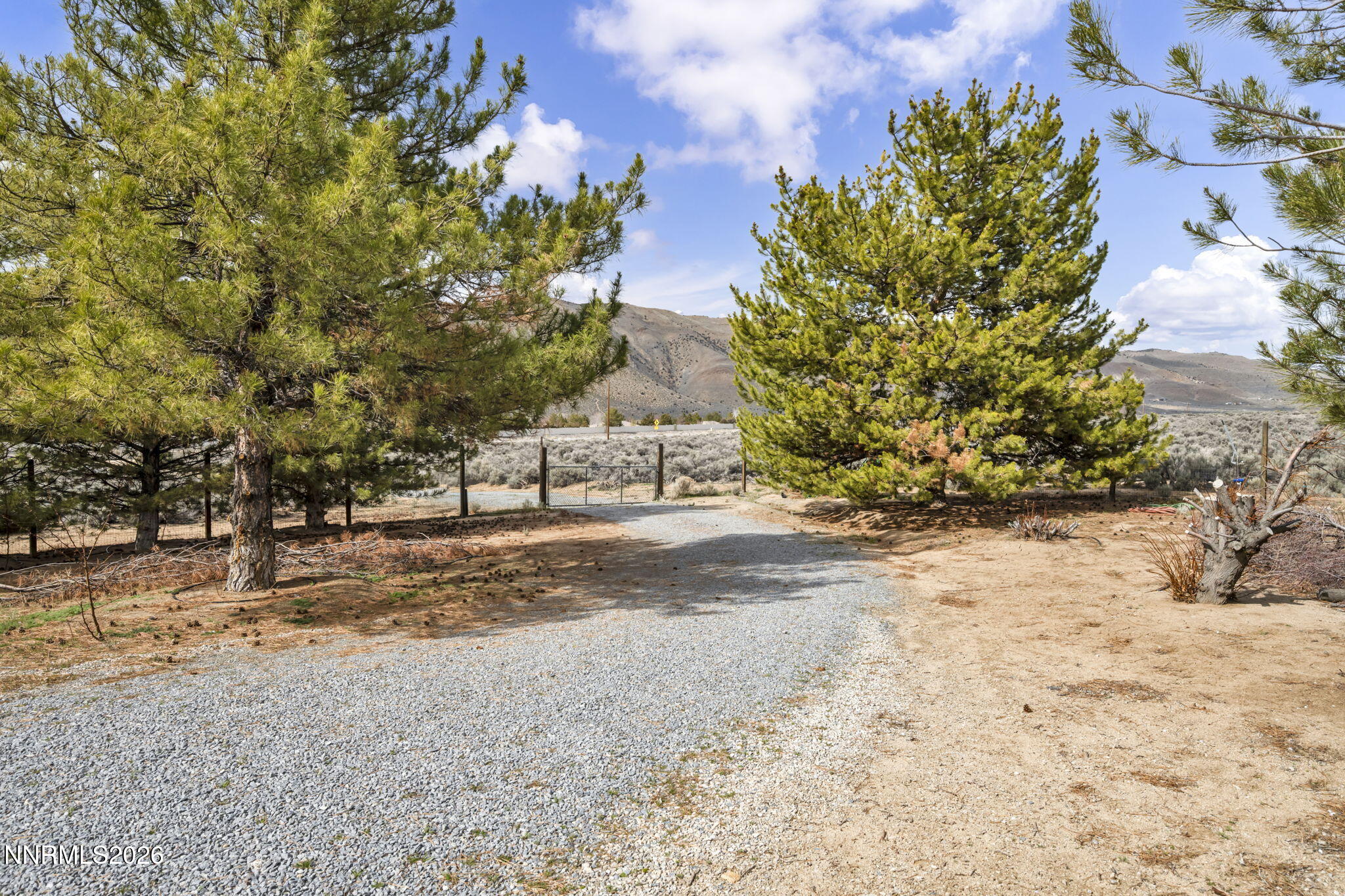 11680 Campo Rico Lane Sparks, NV 89441 - Photo 61 of 61 a view of a yard with wooden fence