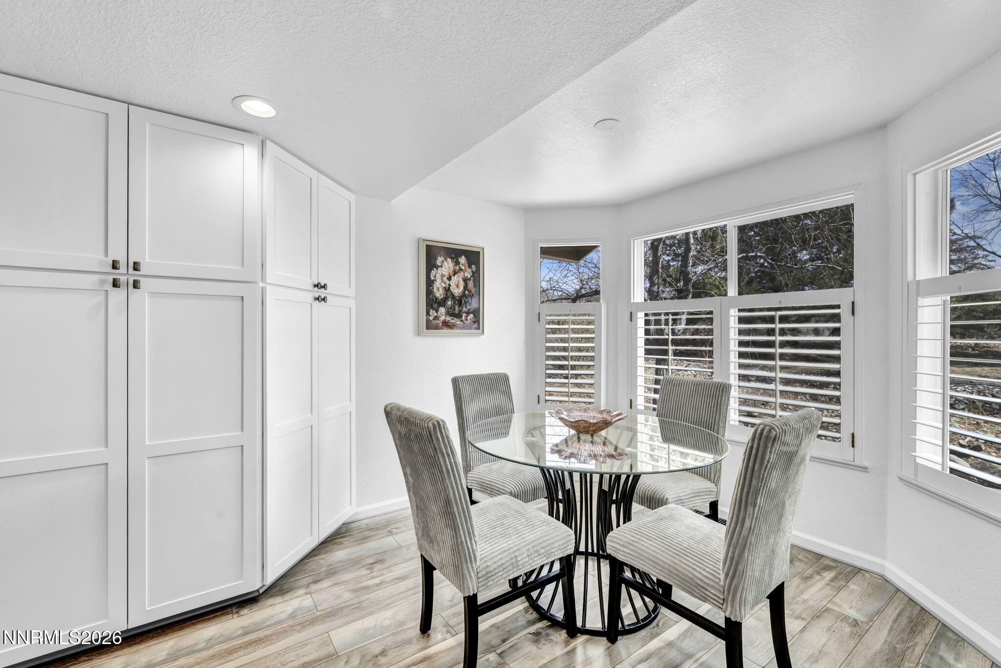 11680 Campo Rico Lane Sparks, NV 89441 - Photo 8 of 61 a view of a dining room with furniture window and wooden floor