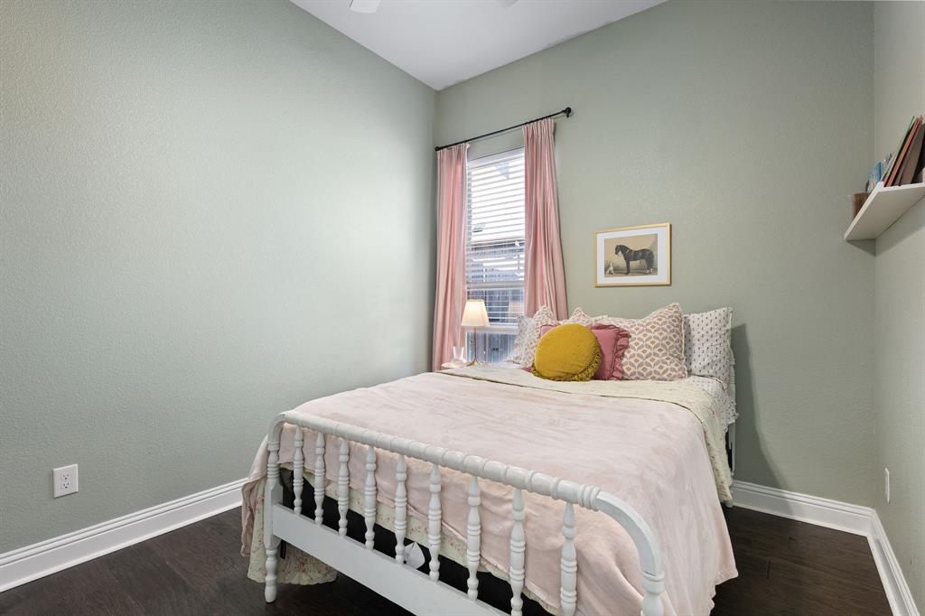 3024 Treasure View Drive Decatur, TX 76234 - Photo 19 of 22 a bedroom with a bed and wooden floor