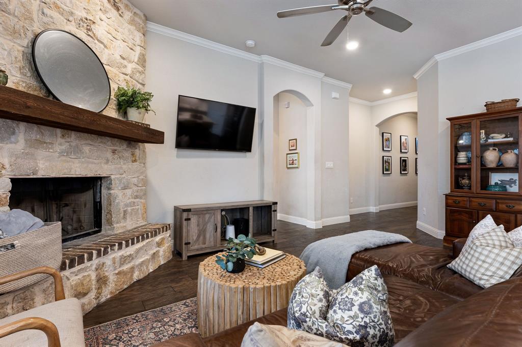 3024 Treasure View Drive Decatur, TX 76234 - Photo 7 of 22 a living room with furniture a fireplace and a flat screen tv