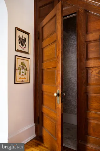 a view of a bathroom with wooden door