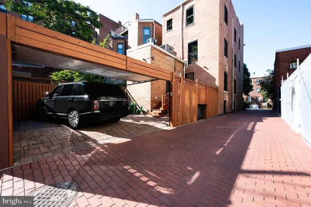 a view of a street with cars