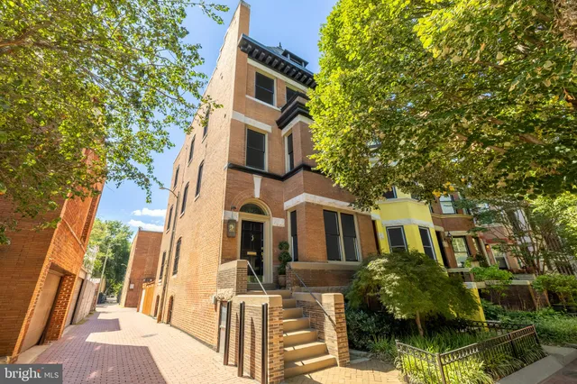 a front view of a multi story residential apartment building