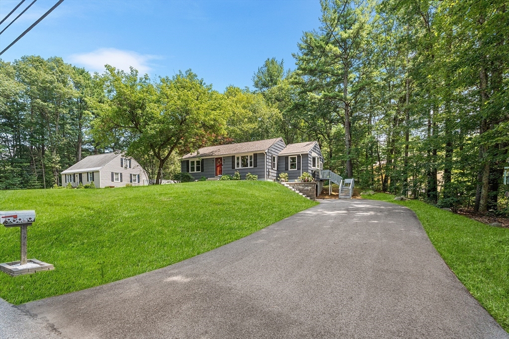 10 Mason Road Holden, MA 01522 - Photo 25 of 27 a front view of a house with yard and green space