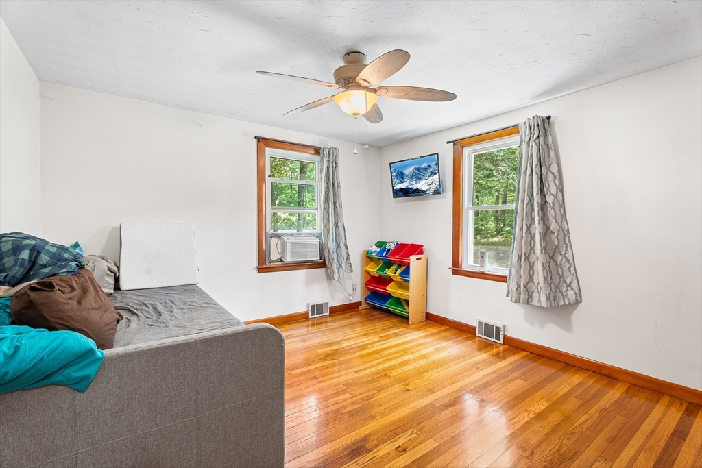 10 Mason Road Holden, MA 01522 - Photo 8 of 27 a bed room with a bed and a window