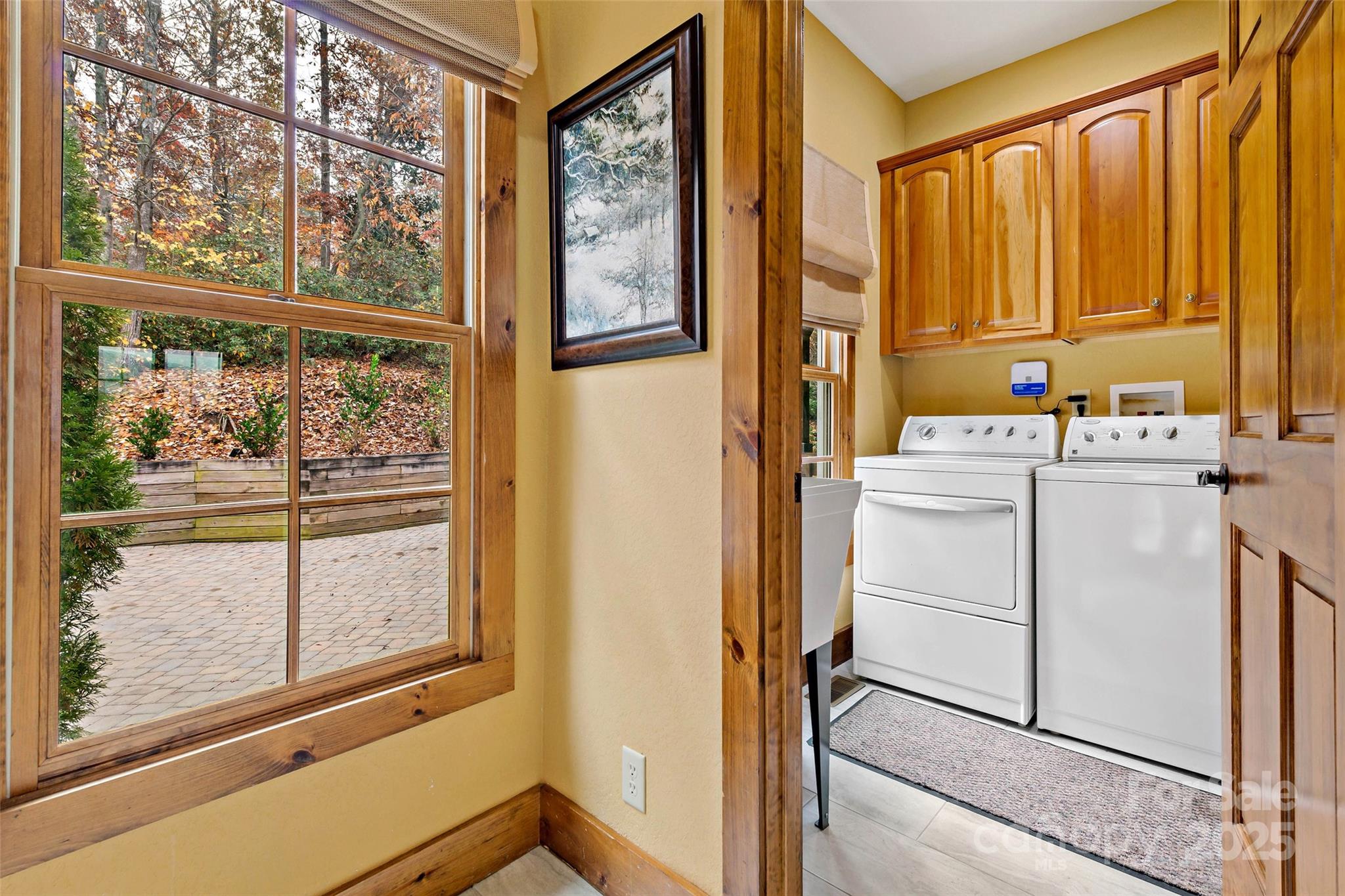 1237 South Cove Road Mill Spring, NC 28756 - Photo 11 of 44 a view of a storage and utility room with a window