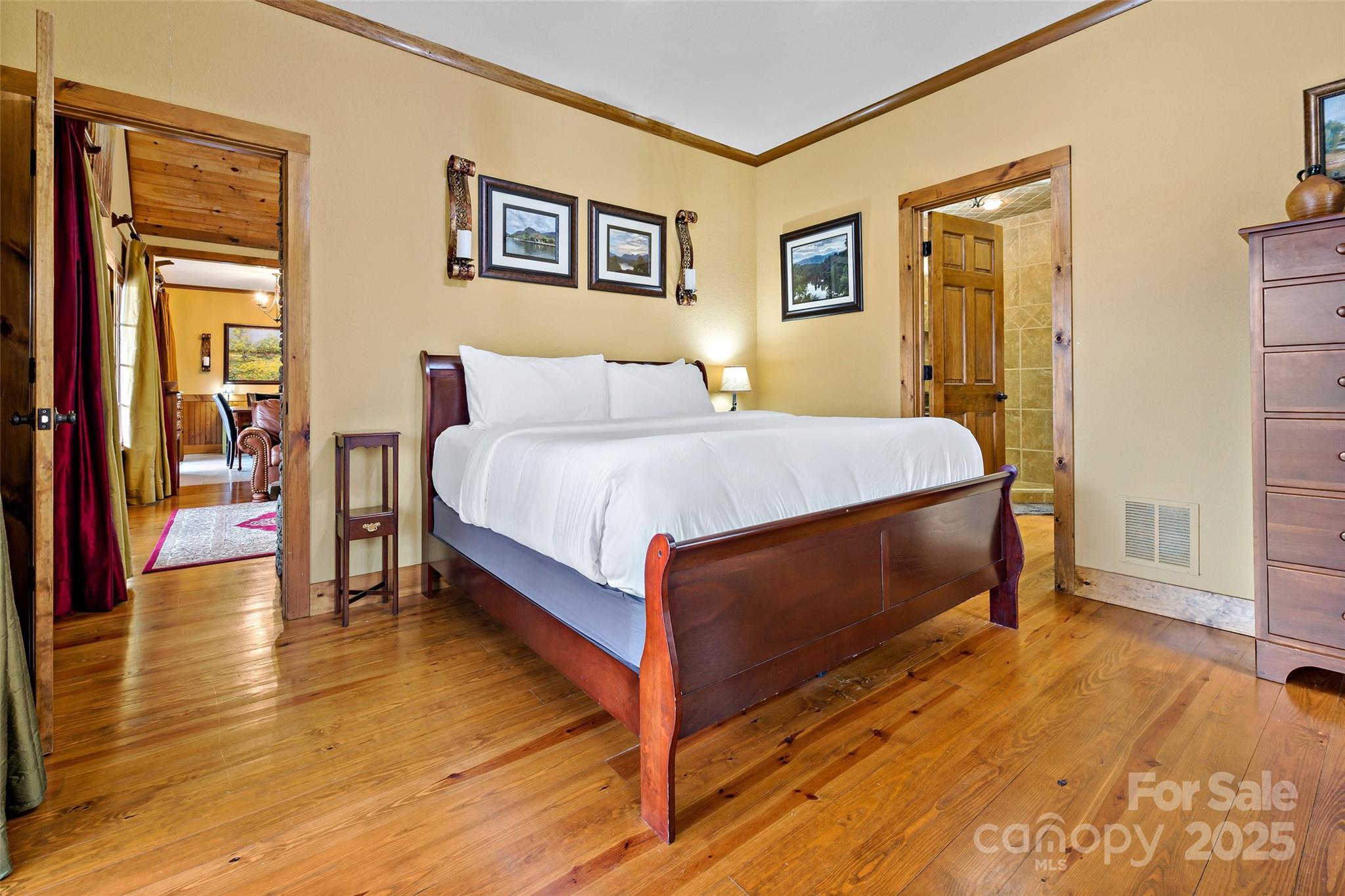 1237 South Cove Road Mill Spring, NC 28756 - Photo 13 of 44 a bed room with a bed and a night stand