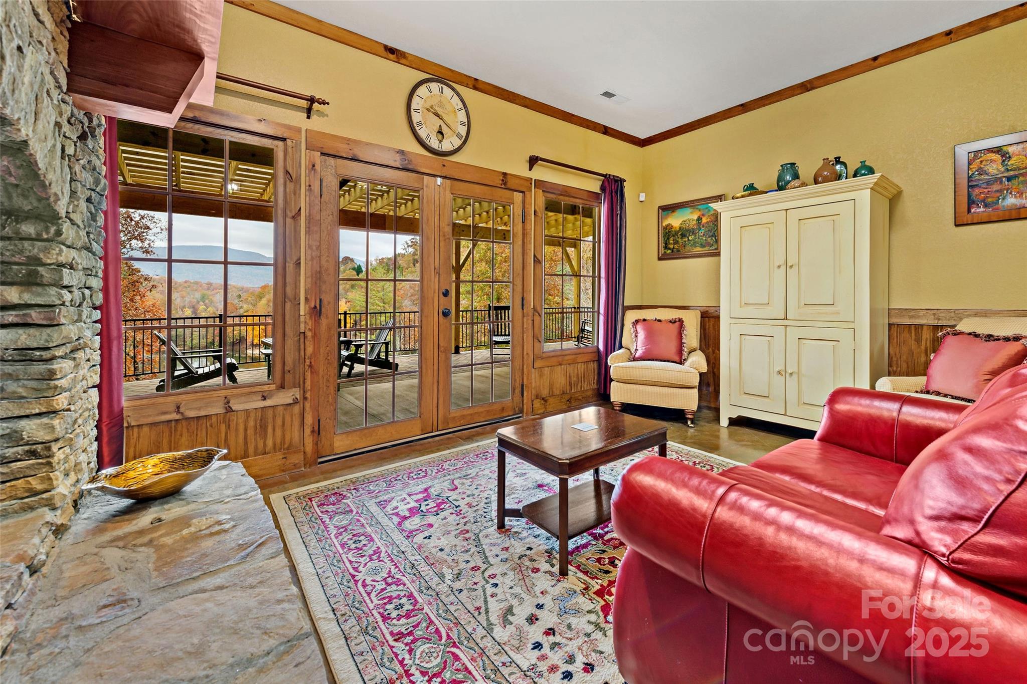 1237 South Cove Road Mill Spring, NC 28756 - Photo 21 of 44 a living room with furniture a rug and a window